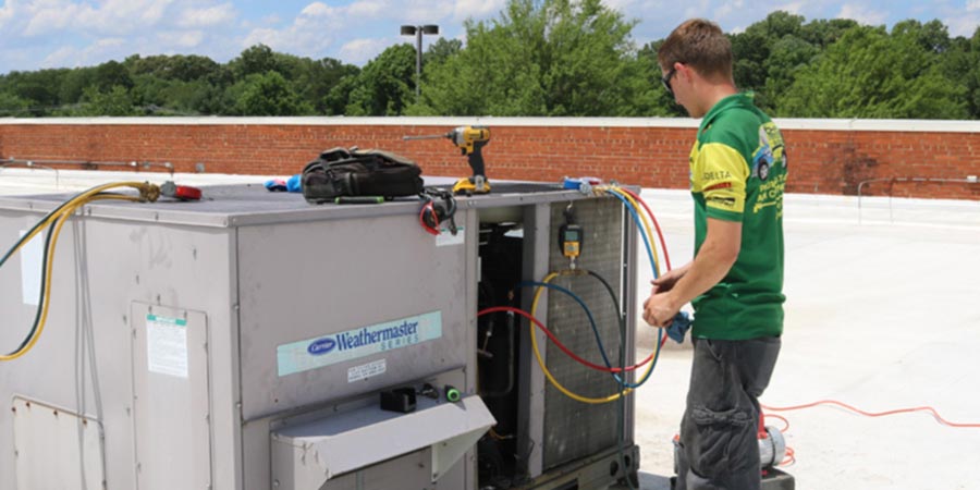 technician working on a commercial unit